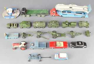 11 Dinky model Military vehicles including 2 x 688 field artillery tractors, do. limber, 643 water tanker, 670 armoured car, armoured personnel carrier, 674 Austin Champ, 2 x 692 medium guns, 693 field gun, a 25lb field gun and 3 Dinky model commercial vehicles - Foden, Carrimore car transporter, a 14A B.E.V. truck, a Corgi Major 1119 H.D.L hovercraft RS/N!, 4 Corgi model vehicles 109 WB Land Rover, a Chrysler Imperial, Riley Pathfinder Police car with Mini Cooper. an unmarked tractor and trailer - play worn  