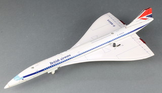 A battery operated model of British Airways Concorde 17 1/2" (dent to fuselage and front under carriage damaged)
