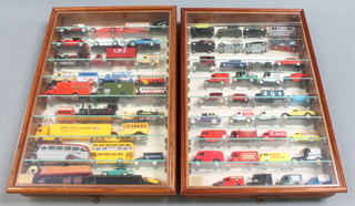 65 various model cars contained in 2 wall mounting display cabinets