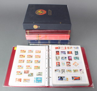 3 albums of Russian stamps 1864-1992 and 4 stock books of Russian stamps 
