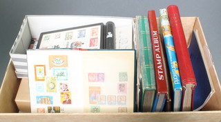 3 albums of World mint and used stamps - Ireland, Germany, USA, Indonesia, South Africa etc, etc,  4 stock books of stamps, a Centennial stamp box and various loose stamps