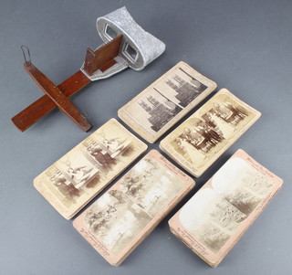 A stereoscopic viewer and 19 cards by Chuck's, 12 by William Raw, 15 by Underwood & Underwood together with 5 other cards