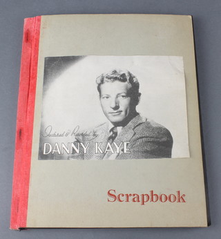 A Danny Kaye signed section of paper marked To Margaret sincerely Danny Kaye together with an account of Danny Kaye's last night at the Palladium and various black and white photographs 