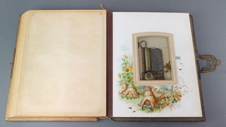 A Victorian leather bound musical box photograph album and a "Regina" album   