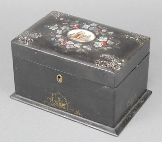 A Victorian black lacquered and inlaid mother of pearl twin compartment tea caddy the lid decorated a view of St Pauls Cathedral 