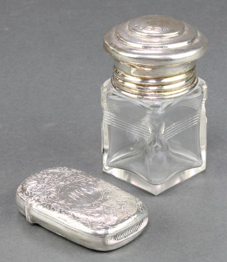 A Victorian silver vesta Birmingham 1892 and a silver mounted toilet jar 