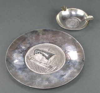 A Persian silver repousse dish together with an ashtray 180 grams