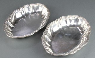 A pair of Swedish silver serving dishes, Sweden 1920, 22 ozs, 10" 