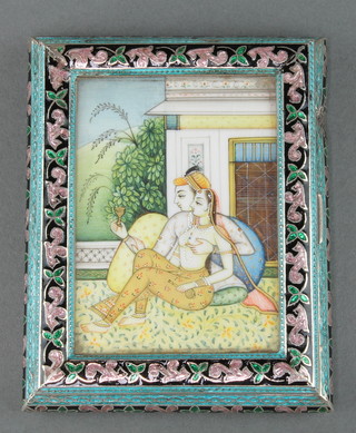 An early 20th Century Indian silver and enamel cigarette box with painted ivory panel, the lid depicting an intimate couple sitting on a veranda the box decorated with flowers 4" x 3" gross 170 grams 