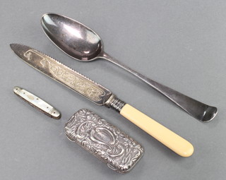 An early Georgian silver table spoon and 3 other items