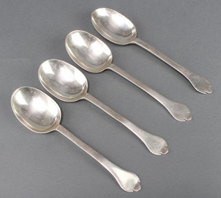 A set of 4 early Georgian trefoil dessert spoons of plain form with rat tail backs and later crests, rubbed marks, London, 7 1/2", 220 grams 