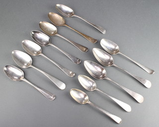 12 early Georgian silver table spoons, marks rubbed, 20 ozs 