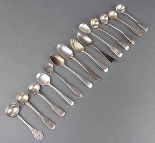 A George III silver tea spoon and minor spoons 180 grams 