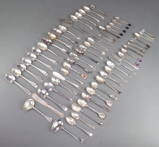 A collection of silver tea spoons, mixed dates, 28 ozs 
