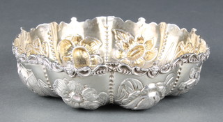 A Victorian repousse silver bowl decorated with fruits and flowers London 1890, 130 grams, 5 1/2" 