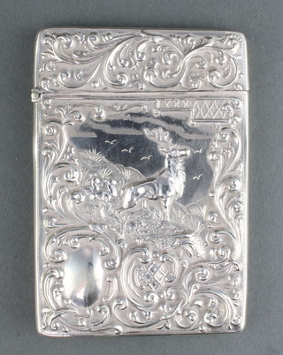 An Edwardian repousse silver card case decorated with a family of deer in a highland setting, the reverse with scrolls and flowers Birmingham 1906 4", maker Crisford & Norris, 50 grams 