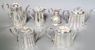 A Victorian silver plated mik jug, 3 ditto teapots and 2 coffee pots