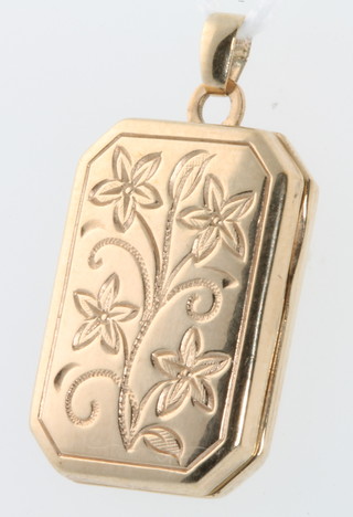 A 9ct yellow gold octagonal locket, gross 1.8 grams 