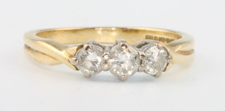 An 18ct yellow gold 3 stone diamond ring, approx 0.5ct size N 