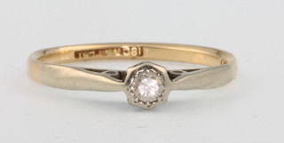 An 18ct yellow gold single stone diamond ring size K 