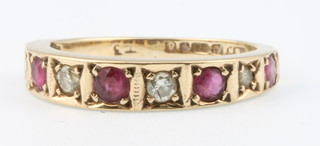 A 9ct yellow gold ruby and diamond half eternity ring size J 