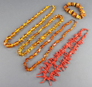 A natural coral necklace, 3 amberoid necklaces and a natural amber bracelet