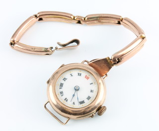 A lady's 9ct yellow gold wristwatch with white enamelled dial and red 12 on a ditto bracelet
