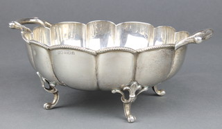 A silver 2 handled lobed bowl on scroll feet Birmingham 1927, 293 grams 