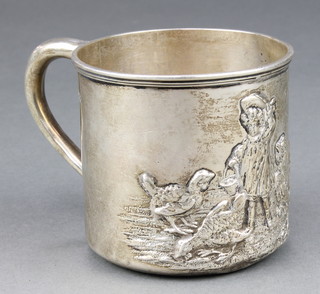 An Edwardian repousse silver mug decorated with a child feeding chickens and hens, Chester 1906 111 grams 