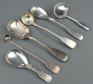 A Victorian silver caddy spoon with chased scroll decoration Birmingham 1852 and 5 other spoons, 80 grams