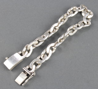 A silver flat link bracelet 62 grams 