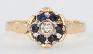 An 18ct yellow gold diamond and gem set ring, size J 3.3 grams