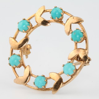 A 9ct yellow gold turquoise set brooch 
