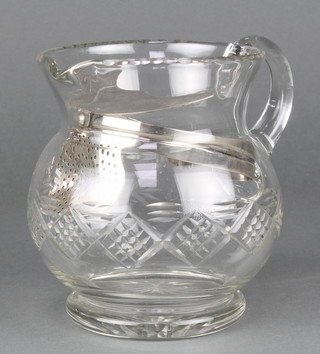 A cut glass baluster jug with Elkington plate strainer 