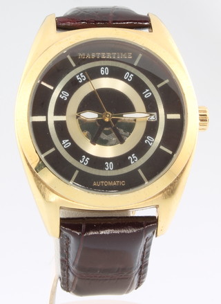 A gentleman's Master Time Automatic wristwatch with visible movement