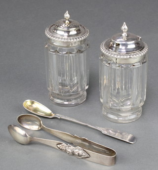 A pair of George IV silver mounted mustard and a ditto pepper, Sheffield 1825 together with a pair of Indian nips and a spoon 