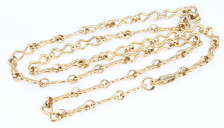 A 9ct yellow gold fancy link necklace 22 grams, 22" long
