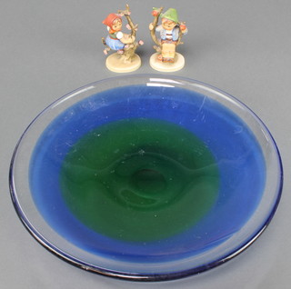 2 Goebel figures of a boy and girl sitting in an apple tree 1413/0 and 1423/0 4" and an Art Glass shallow dish 12" 