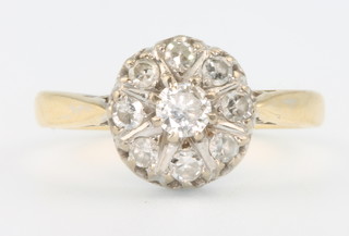 A yellow gold 9 stone diamond cluster ring, size O