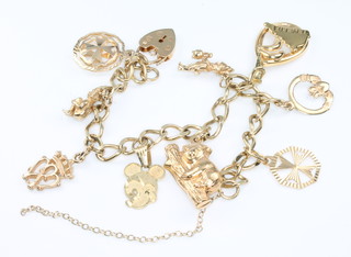A 9ct yellow gold charm bracelet with padlock, 17.5 grams 