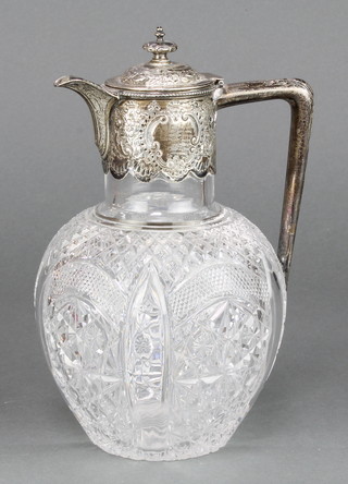A Victorian silver mounted cut glass claret jug with repousse floral decoration, Sheffield 1894, 9" 