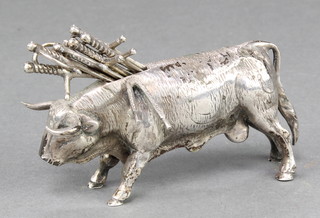 A Spanish silver cocktail stick holder in the form of a bull, the cocktail sticks in the form of swords, 3 1/2", 88 grams