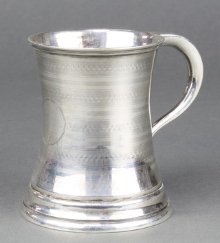A silver waisted mug with engine turned decoration Birmingham 1913, 162 grams 