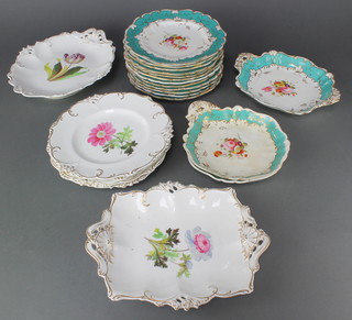 A Victorian dessert set, the turquoise gilt borders enclosing spring flowers comprising 2 shell shaped dishes, a 2 handled dish and 12 dessert plates, together with a similar service with gilt rims and spring flowers comprising 2 dishes and 4 plates