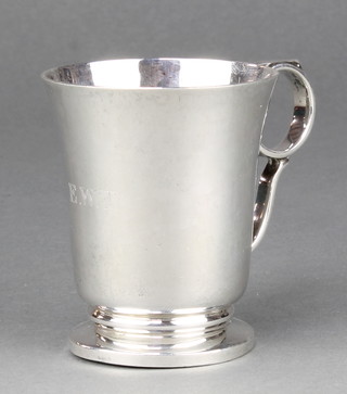 An Art Deco silver mug with ring handle Chester 1938 128 grams