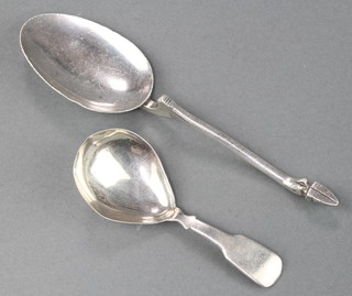 A fancy sterling silver serving spoon with hoof handle, inscribed facsimile of spoon found at Taxila, 1914 together with a Georgian silver caddy spoon, 72 grams

