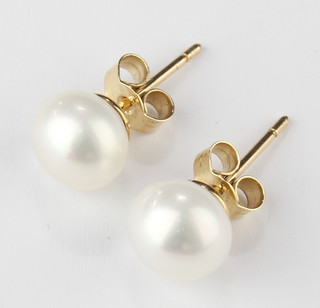 A pair of 9ct yellow gold cultured pearl ear studs