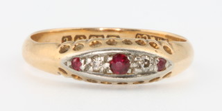 An 18ct yellow gold diamond and ruby ring, size O 