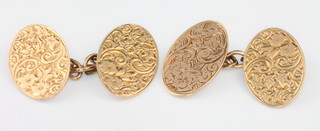 A pair of 9ct oval engraved cufflinks 6.2 grams 