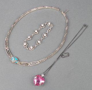 A silver fancy link necklace, a ditto bracelet and pendant on chain 